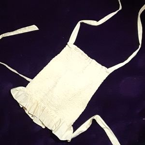 A yellow strapped crop top